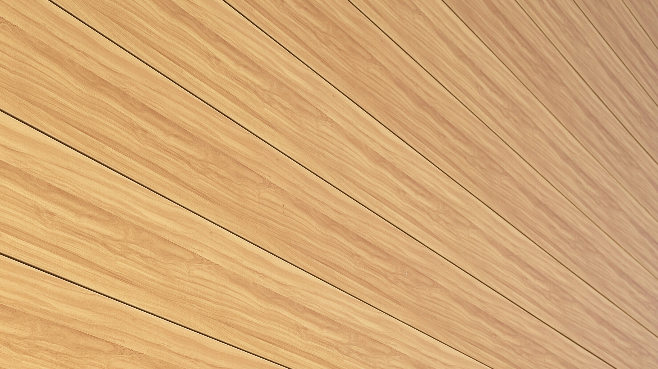 Detailný pohľad na hliníkovú fasádu z PREFA Sidingu v farbe dub prírodný na rodinnom dome v Usingenu, Nemecko