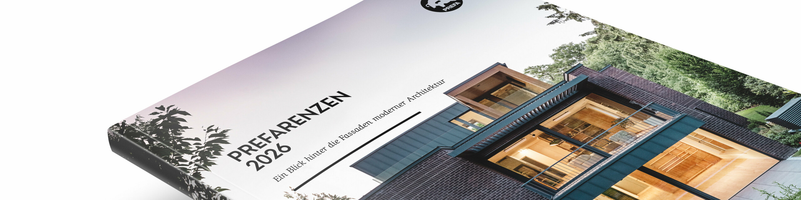 Auf dem Bild ist ein PREFARENZEN-Buch zu sehen, das zugeschlagen auf einem weißen Hintergrund quer liegt.